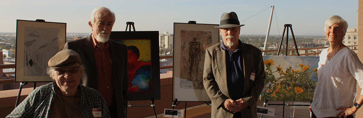 Emeritus Art Collection - retired ASU faculty members standing in front of artwork on easels