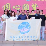 students holding a banner