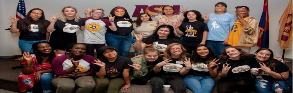 Group of students posing at a general club meeting